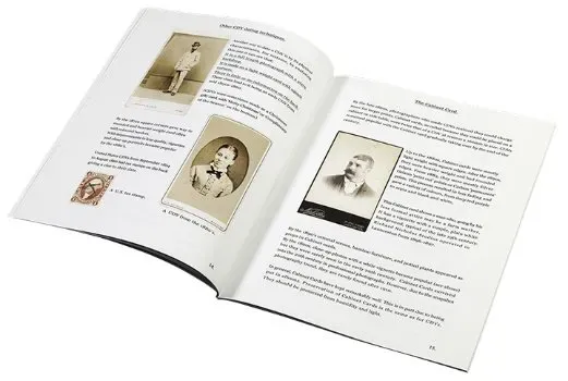 The book open at a spread of sample photographs